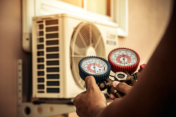 Professional Air Conditioning Service technician working in West Somerset, KY